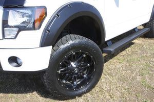 Lund 16-17 Nissan Titan XD RX-Rivet Style Textured Elite Series Fender Flares - Black (2 Pc.)