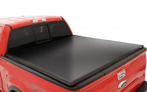 Lund 04-15 Nissan Titan (6.5ft. Bed w/o Utility TRack) Genesis Tri-Fold Tonneau Cover - Black