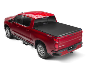 Lund 07-13 Toyota Tundra Fleetside (6.5ft. Bed) Hard Fold Tonneau Cover - Black