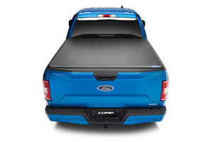 Lund 05-10 Dodge Dakota Fleetside (5.3ft. Bed) Hard Fold Tonneau Cover - Black