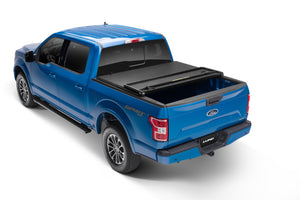 Lund 05-10 Dodge Dakota Fleetside (5.3ft. Bed) Hard Fold Tonneau Cover - Black